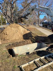 Mainline Sewer Excavation digging and repairing a drain line underground